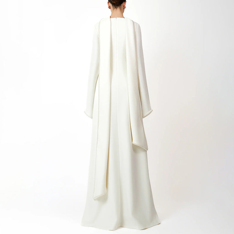 long-sleeve column gown with draped cape trim – CELEVTER