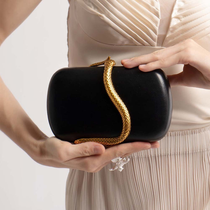 oval clutch with gold snake wrap detail – SERPENTILA