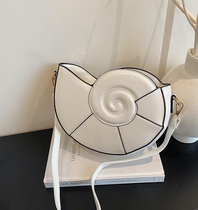 spiral shell crossbody bag with curved design – NAUTILA