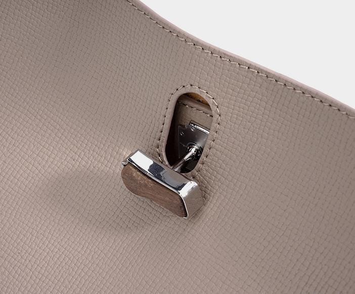 structured leather handbag with metallic twist lock – MORILA