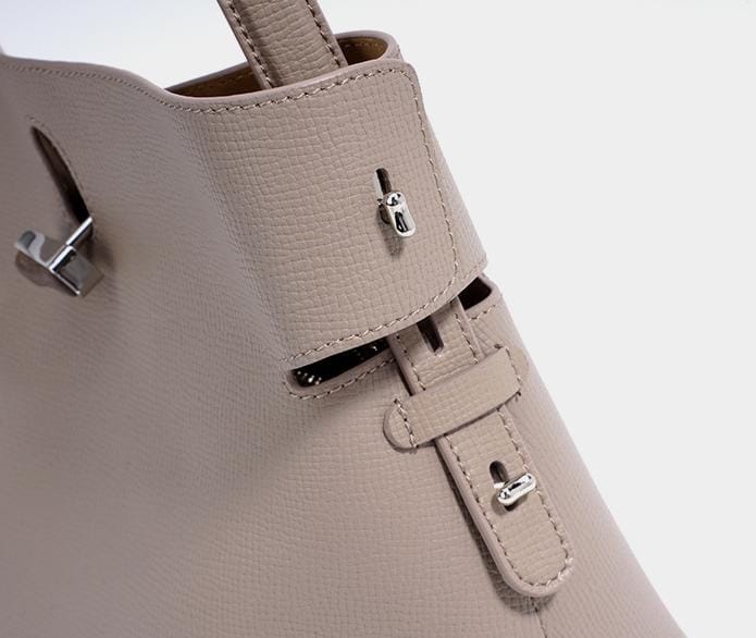 structured leather handbag with metallic twist lock – MORILA