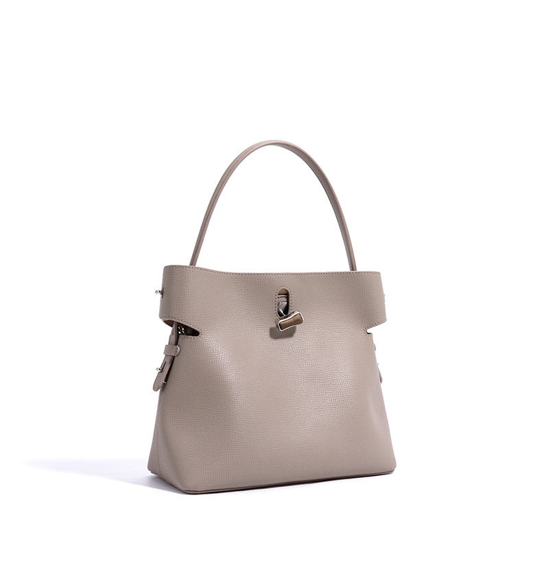 structured leather handbag with metallic twist lock – MORILA