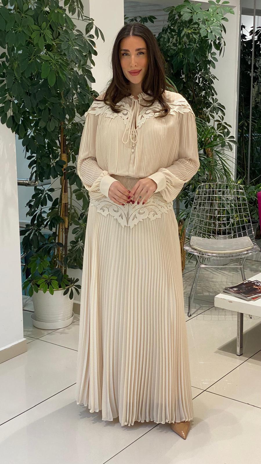 pleated maxi dress with embroidered neckline and waist detail – ELYSEE