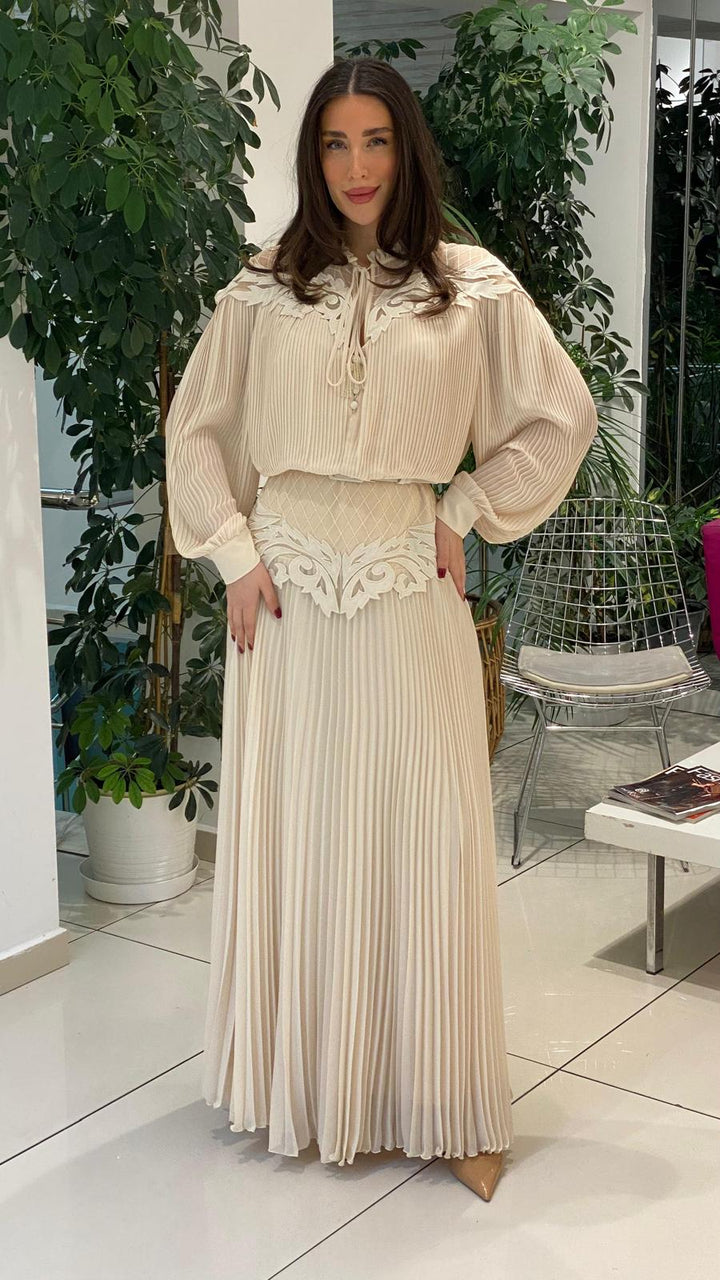 pleated maxi dress with embroidered neckline and waist detail – ELYSEE