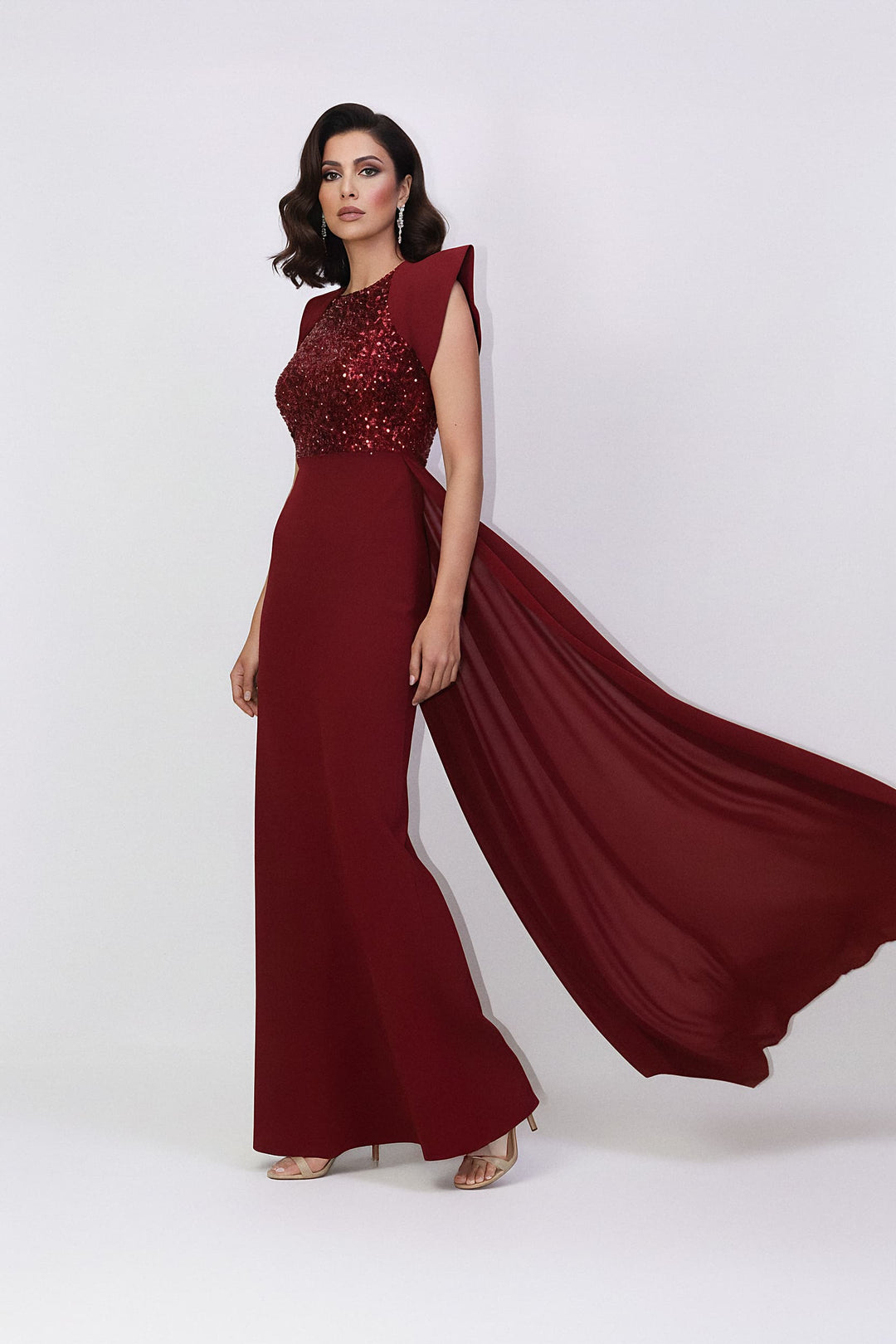 sleeveless gown with sequined bodice and structured cape shoulders – RELYE