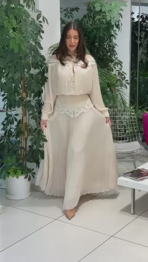 pleated maxi dress with embroidered neckline and waist detail – ELYSEE