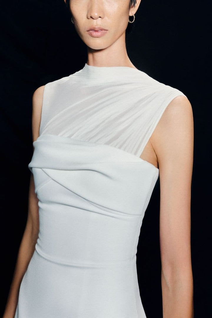 فستان ميدي أنيق بفتحة رقبة شفافة مطوية – عاجي